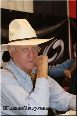 Larry Hagman at his table