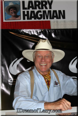 Larry Hagman at his table