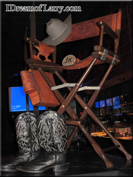 Chair, hat, boots at memorial